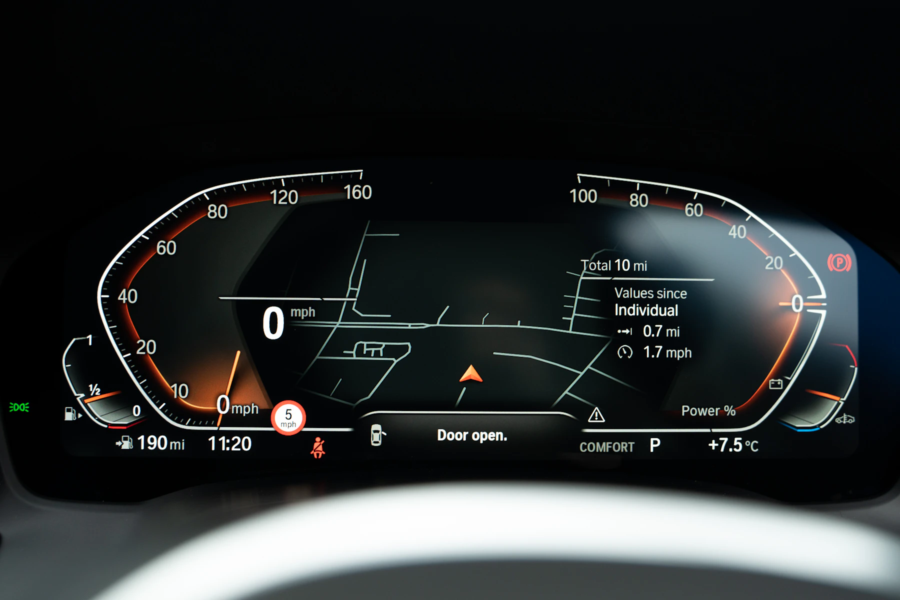 Digital instrument cluster showing speed and navigation